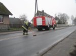 Zdjcia z wypadku samochodowego na K-11 oraz usuwania oleju. 6.12.2009r.